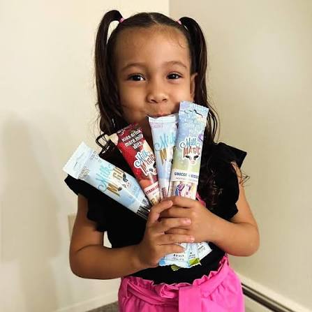 Girl holding a bouquet of Magic Straws